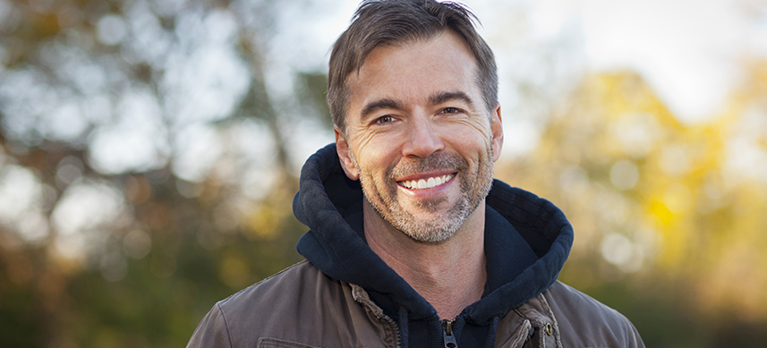 Portrait of A Mature Man Smiling at the camera